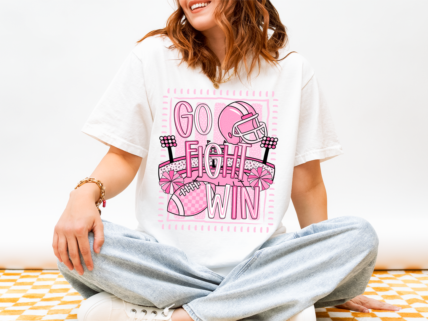 GO FIGHT WIN PINK FOOTBALL GRAPHIC TEE