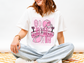 GO FIGHT WIN PINK FOOTBALL GRAPHIC TEE